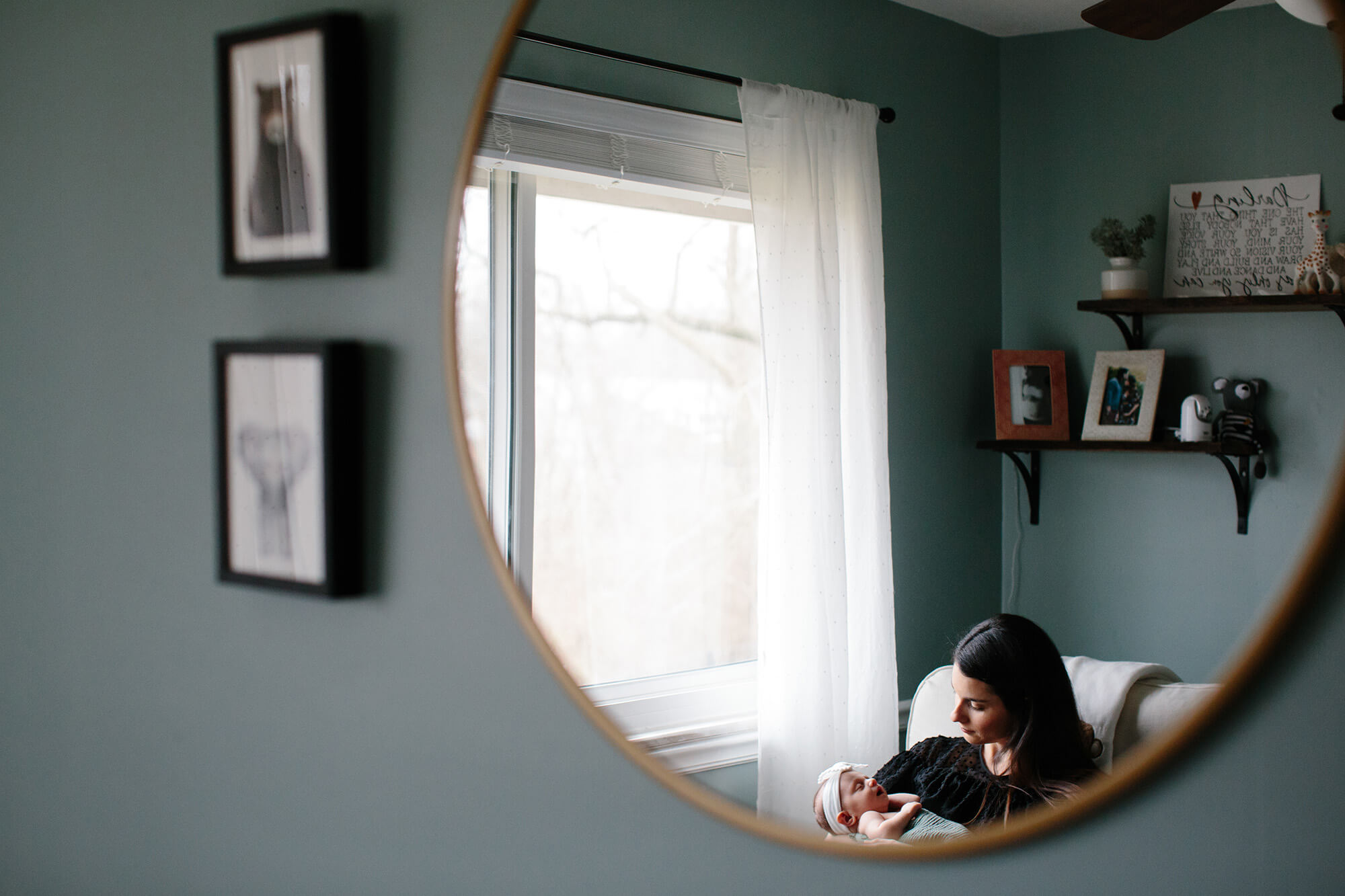 in home family photography by Angie Menos - st. louis lifestyle family portraits - mom with newborn